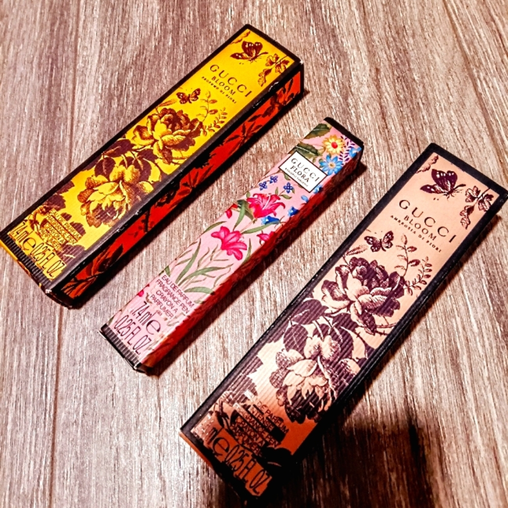 3 Gucci rollerball perfumes! Gucci Flora and 2 of the Gucci blooms.